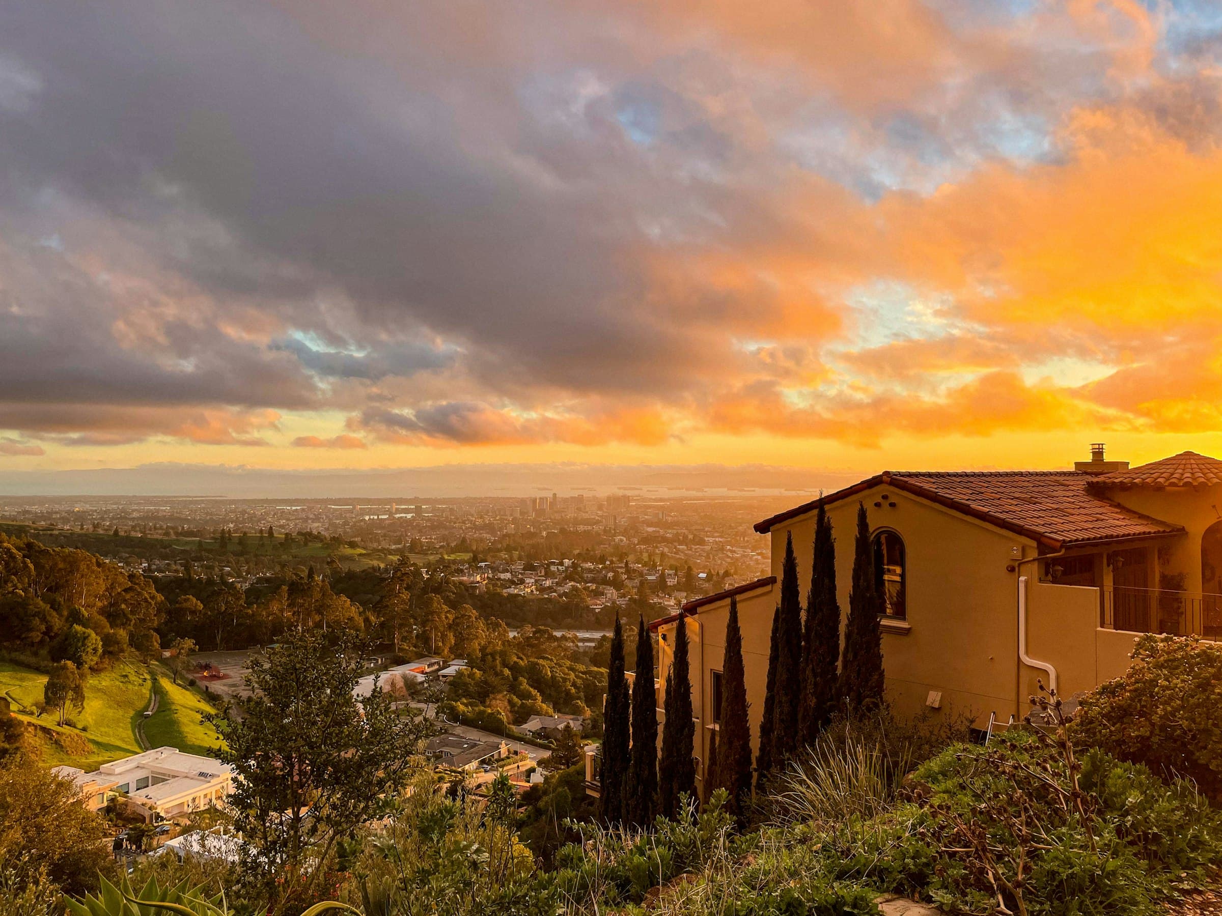 Hillside homes above the Bay at sunset